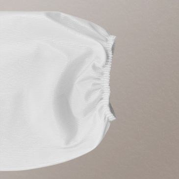 Bata protectora impermeable de un solo uso detalle manga